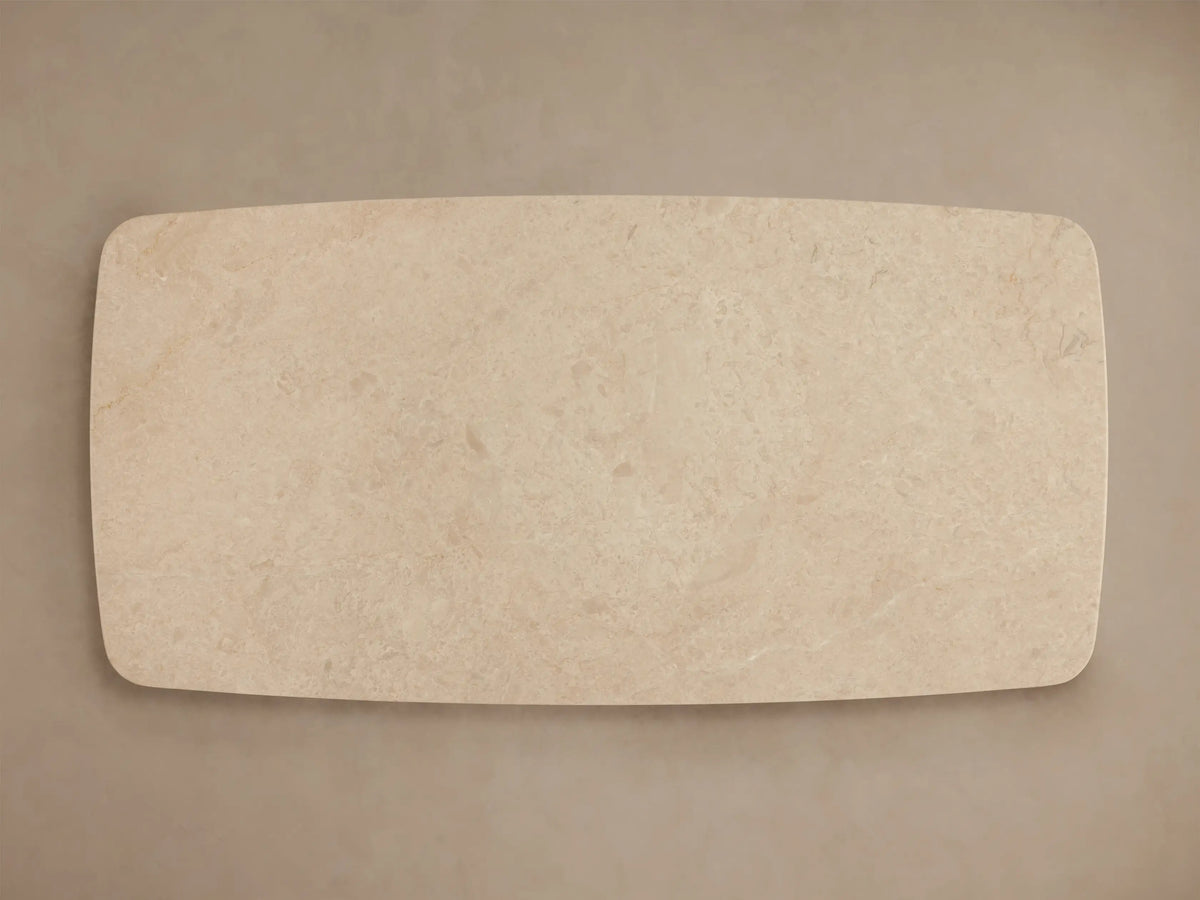 Front view of the cream Saint Germain Stone Coffee Table with a light oak Rennes Base, featuring rounded edges.