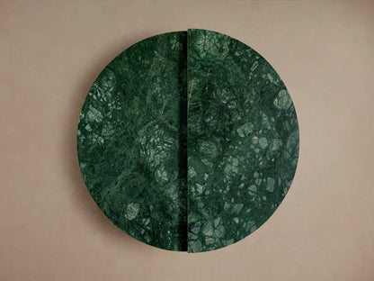 Green marble Riggs Coffee Table with a geometric, angular design. The surface features intricate natural patterns and a smooth finish.