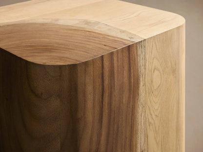 Front view of the light natural wood Ramiro End Table, a solid cube with gently rounded edges and visible oak wood grain.