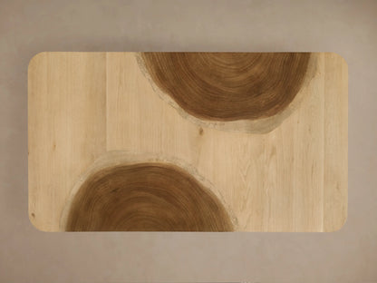 Ramiro Coffee Table with wavy American oak & Guanacaste wood pattern across its curved top & side.
