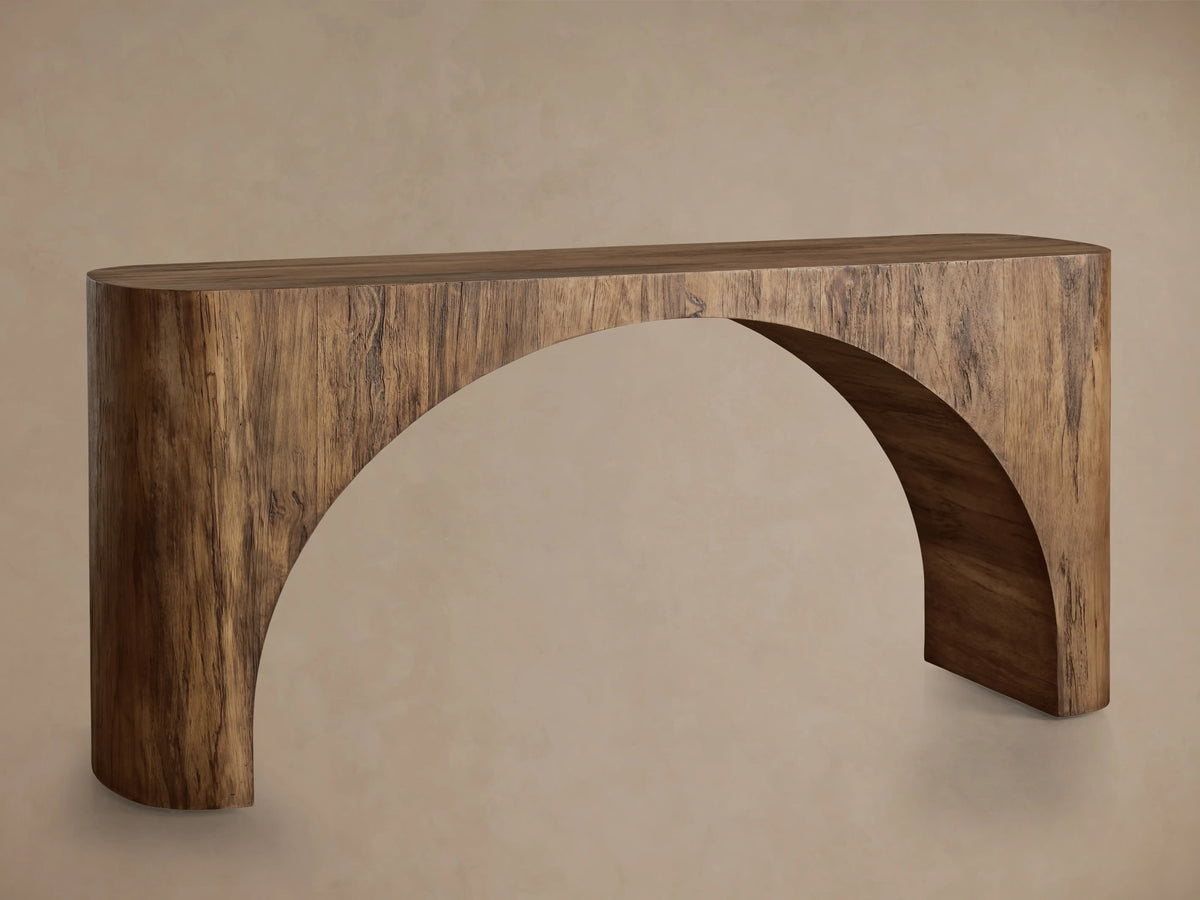 San Rafael Console Table: Arched wood console table in distressed medium-brown finish, with visible grain on a plain background.