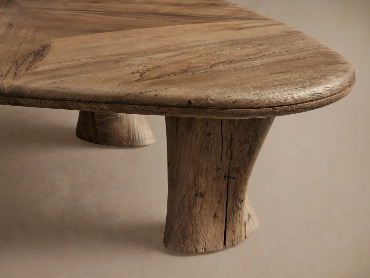 Soumaya Coffee Table: Organic natural spalted primavera wood coffee table with radial top, rounded edge, and thick mahogany legs.