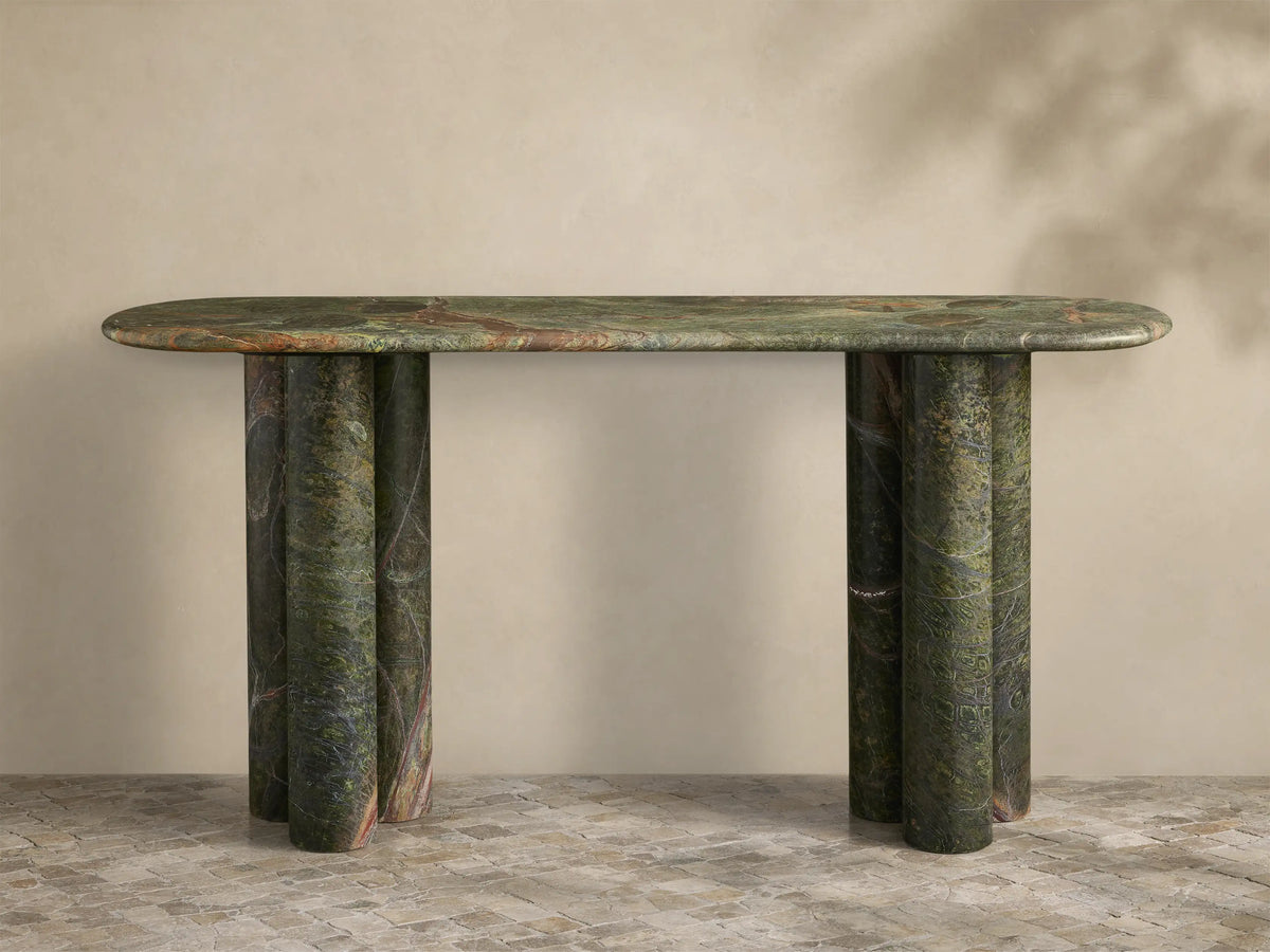 Front view of a Green Marble Console Table with an oblong top and two sets of three rounded cylindrical legs.