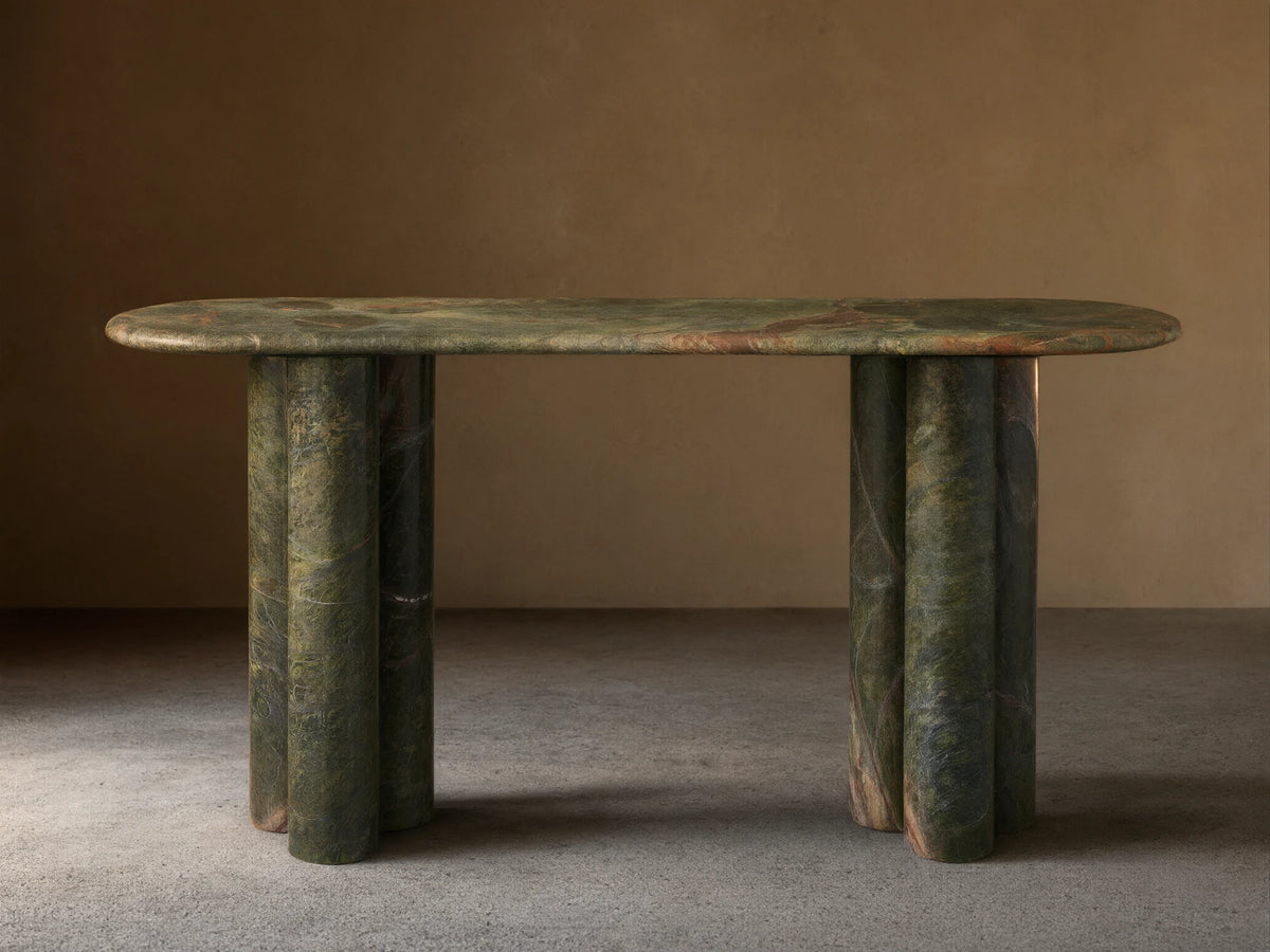 Front view of a Green Marble Console Table with an oblong top and two sets of three rounded cylindrical legs.