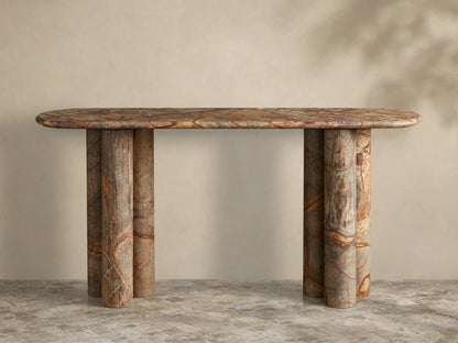 Front view of a multicolor marbled stone console table with an oval top and two clusters of three cylindrical legs.