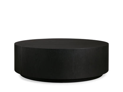 Sullivan Round Coffee Table in black oak finish, showing top view of the smooth tabletop with subtle grain patterns.