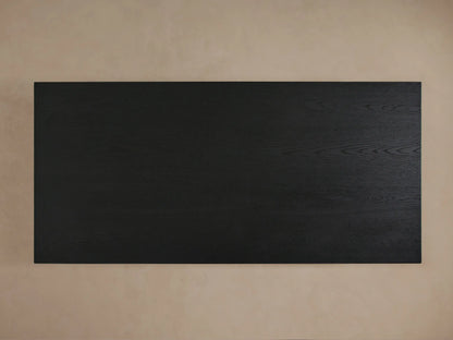 Sullivan Waterfall Coffee Table made from dark oak, featuring a seamless miter joinery waterfall edge and visible wood grain details.