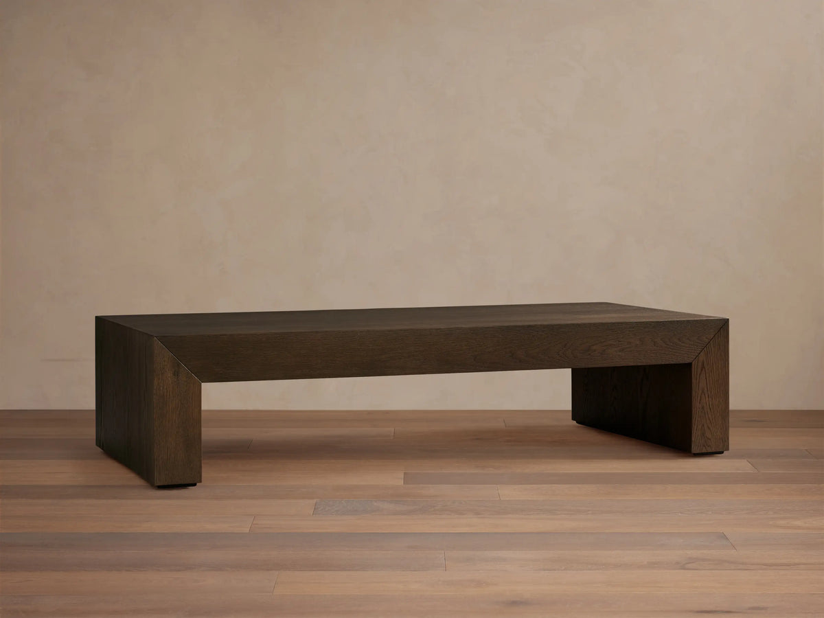 Sullivan Waterfall Coffee Table in dark oak with a miter joinery design, displaying natural graining and a matte finish.