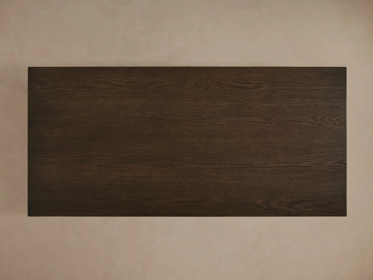 Sullivan Waterfall Coffee Table in dark European oak with visible natural grain, miter joinery, and matte finish.