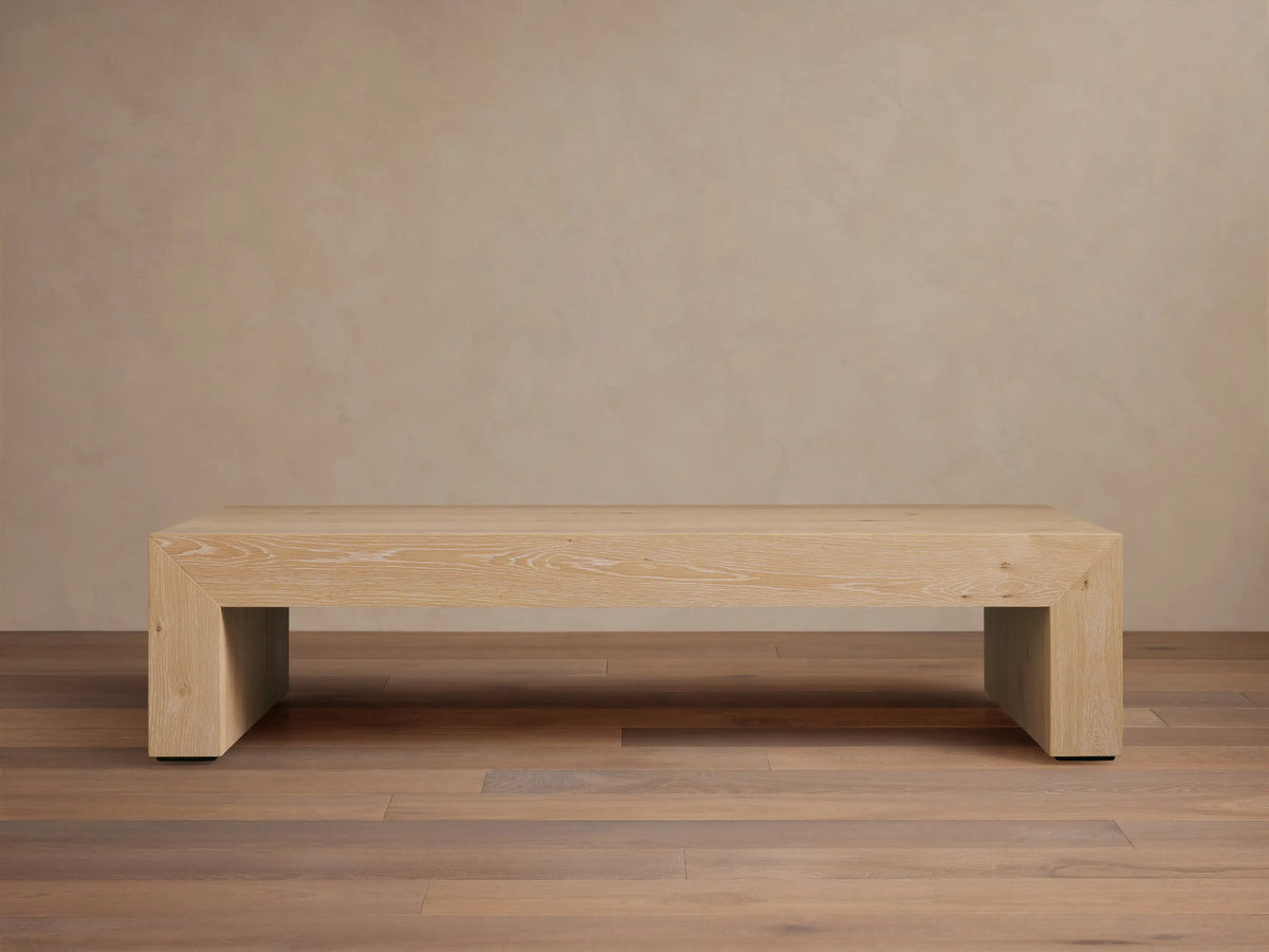 Sullivan Waterfall Coffee Table crafted from light European oak, displaying unique graining and miter joinery with a waterfall effect.