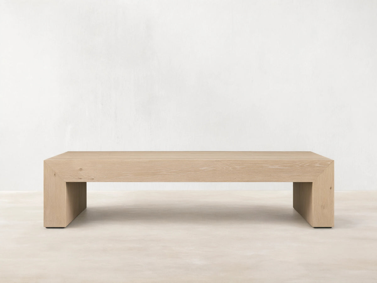 Sullivan Waterfall Coffee Table crafted from light European oak, displaying unique graining and miter joinery with a waterfall effect.