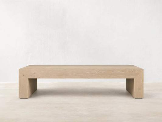 Sullivan Waterfall Coffee Table crafted from light European oak, displaying unique graining and miter joinery with a waterfall effect.
