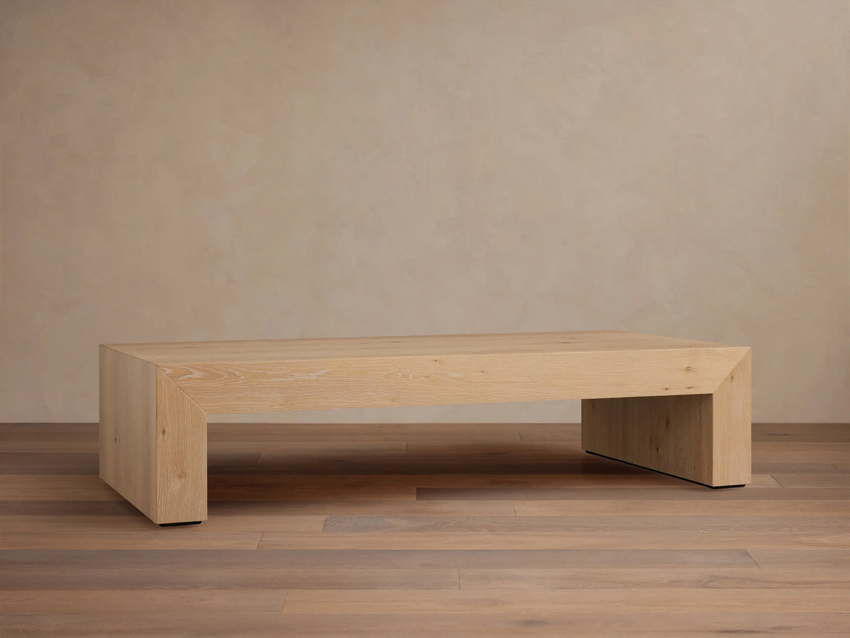 Sullivan Waterfall Coffee Table crafted from light European oak, displaying unique graining and miter joinery with a waterfall effect.