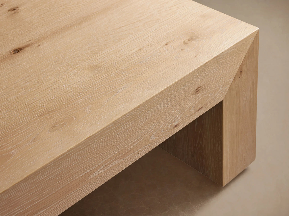 Sullivan Waterfall Coffee Table made of light oak wood with visible grain and mitered sides creating a continuous flow.