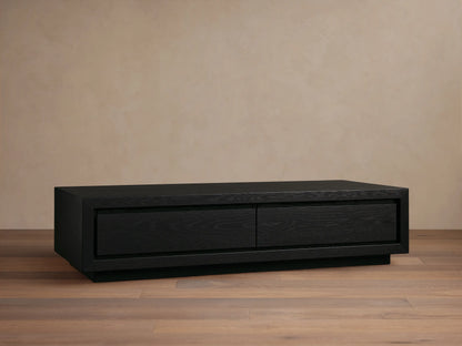 Dark brown wood Sullivan Storage Coffee Table with two soft-close drawers, styled with books and a decorative cloche.