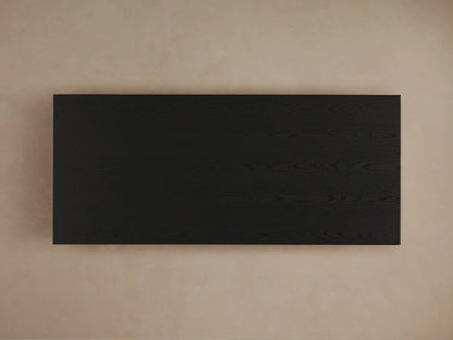 Sullivan Storage Coffee Table with black oak veneer, showing open drawer with soft-close mechanism and visible wood grain texture.