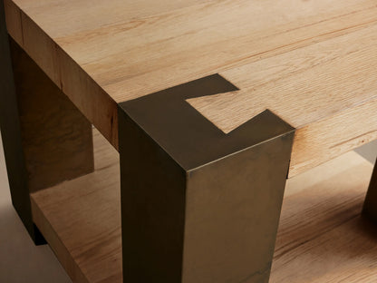 Telluride End Table, square. Light oak wood top & shelf, framed by dark, distressed oxidized steel legs on a wood floor.