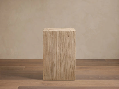 Front view of a light, warm beige Driftwood Ubud Pedestal made from reclaimed teak with rustic texture.
