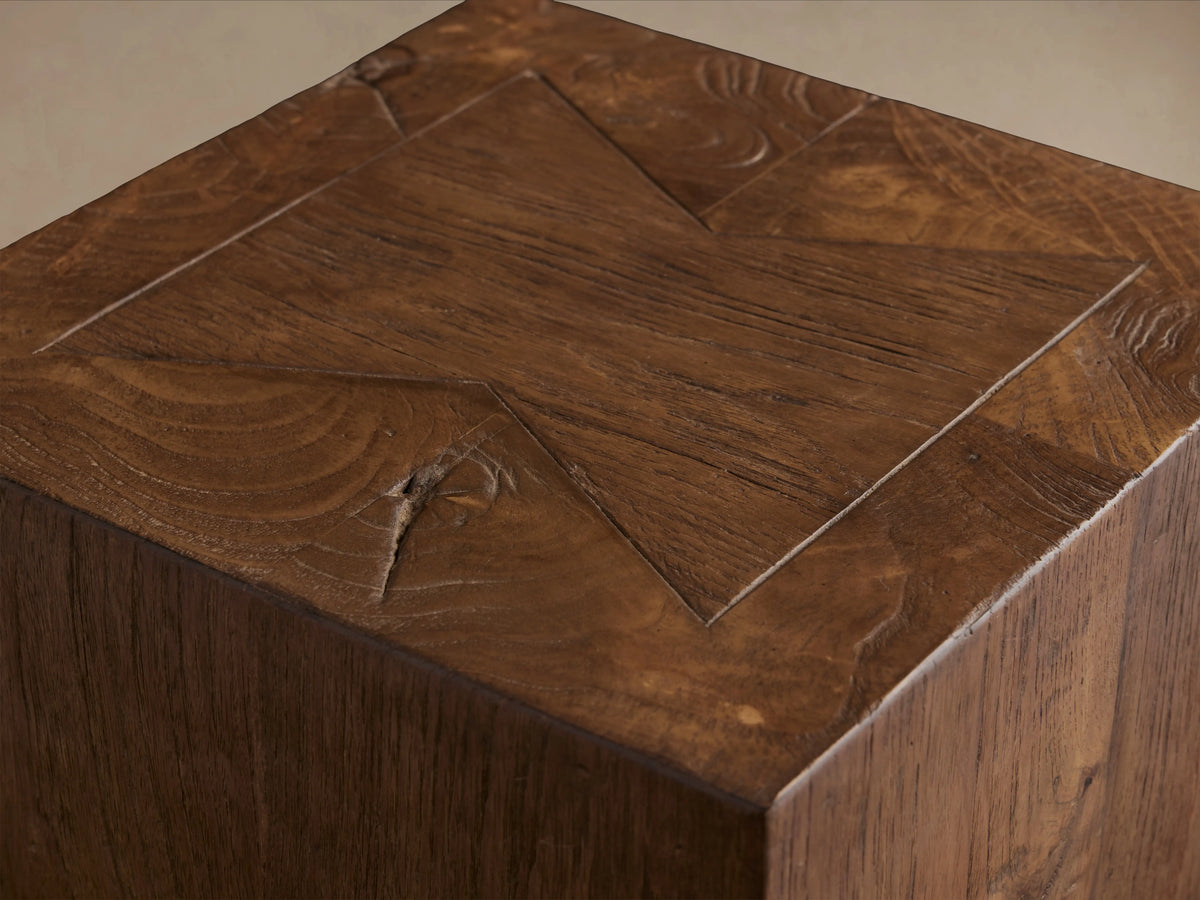 Ubud Pedestal made of reclaimed teak wood in natural waxed finish, showing vertical grain patterns and warm brown tones.