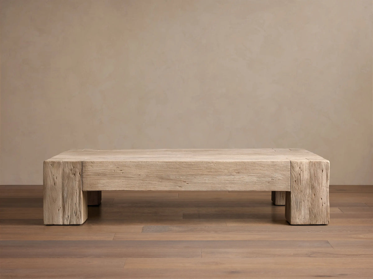 Front view of the light beige Driftwood finish Ubud Coffee Table, showcasing its square shape and reclaimed teak wood texture.