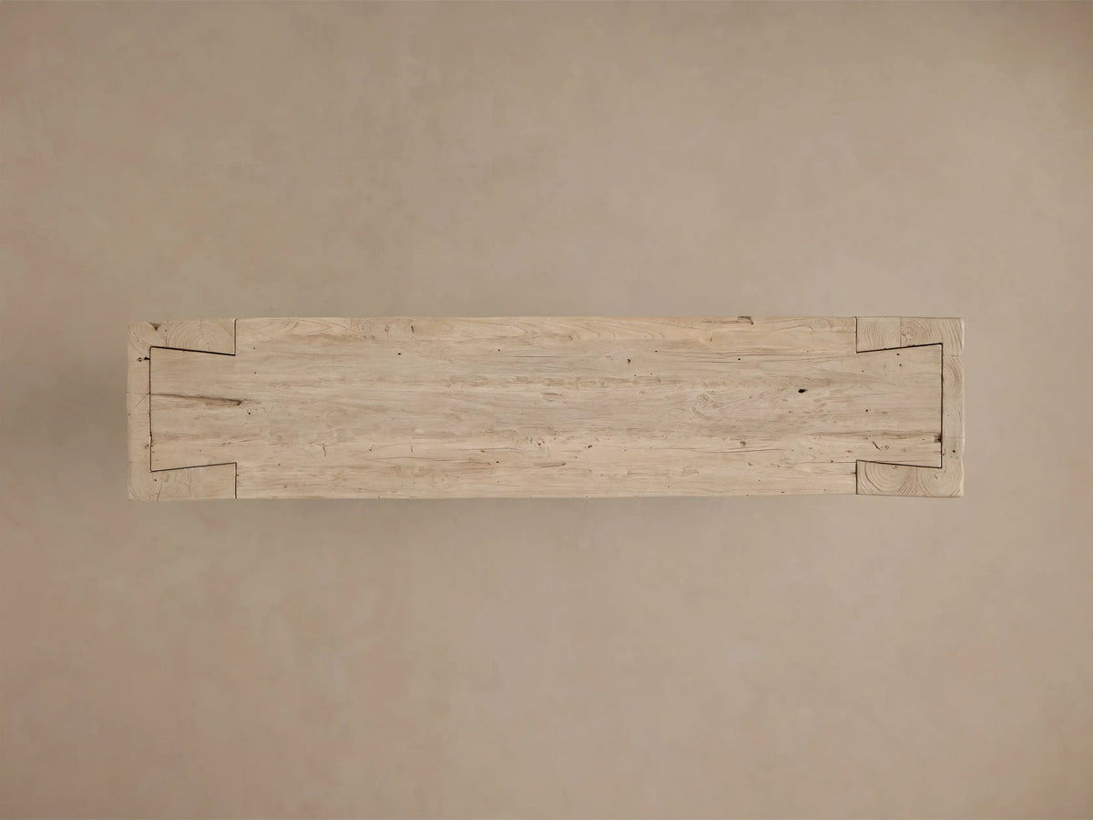 Top view of the Driftwood finish Ubud Console Table, highlighting its light beige reclaimed teak wood and unique finger joinery.