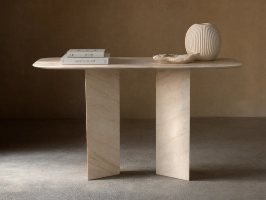Vesuvius Console Table: Light natural marble console with a rounded rectangular top and two thick, angular panel legs.