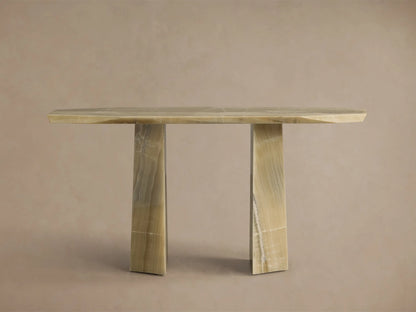 Front view of the light green onyx Zyra Console Table, featuring an asymmetrical top and two pedestal bases with natural striations.