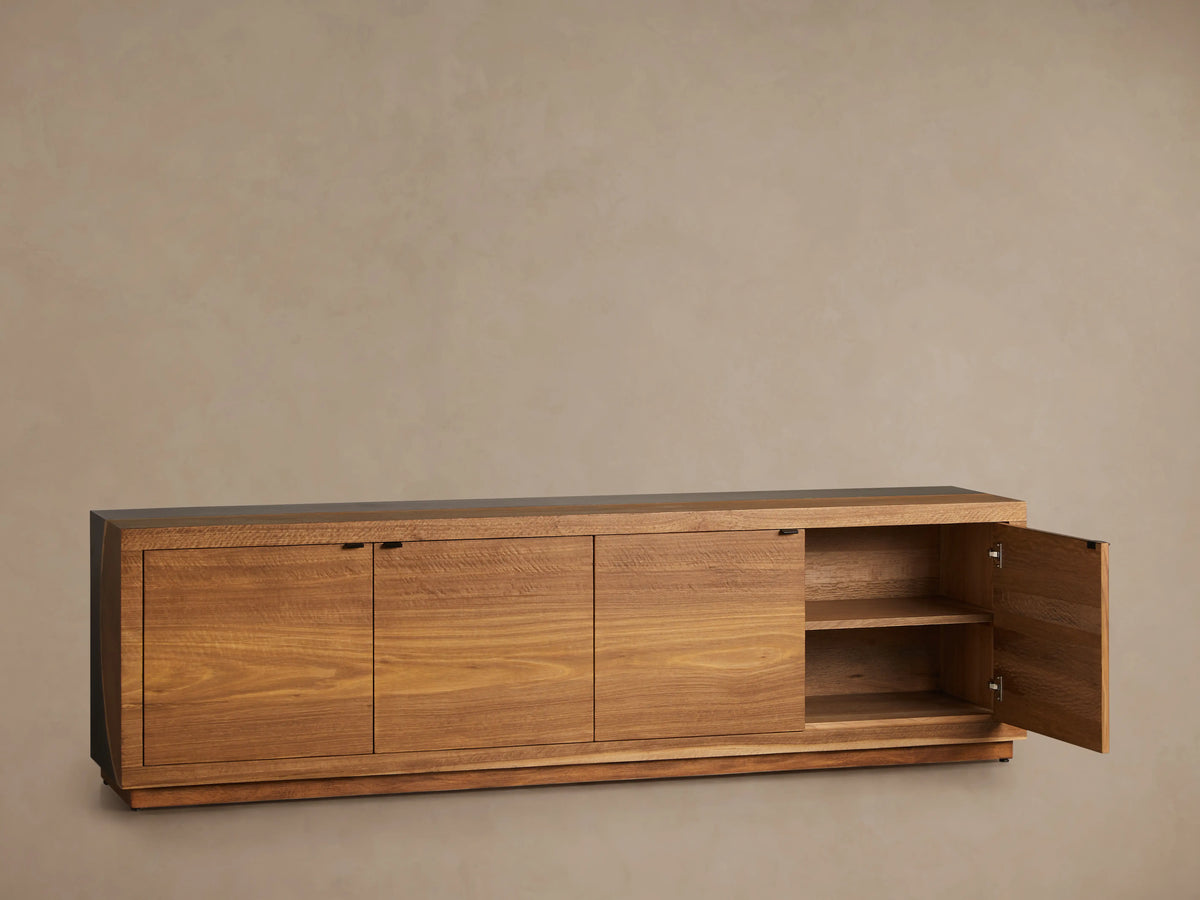 Acacius Media Console with wood veneer finish, showing smooth cabinet doors on soft-close hinges, and natural wood grain pattern.
