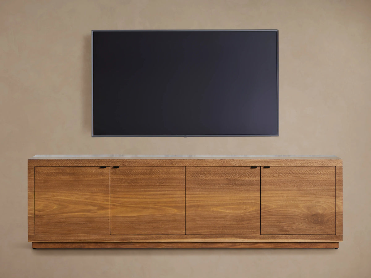 Acacius Media Console with naturally oxidized steel top and reclaimed yukas wood veneer. One door open showing interior shelves.