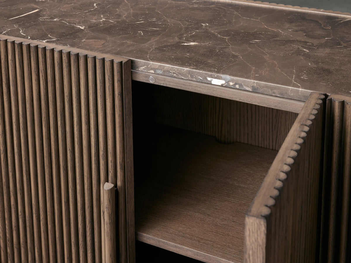 Astor Sideboard in dark oak finish, showcasing reeding detail and open left cabinet door with interior shelving.