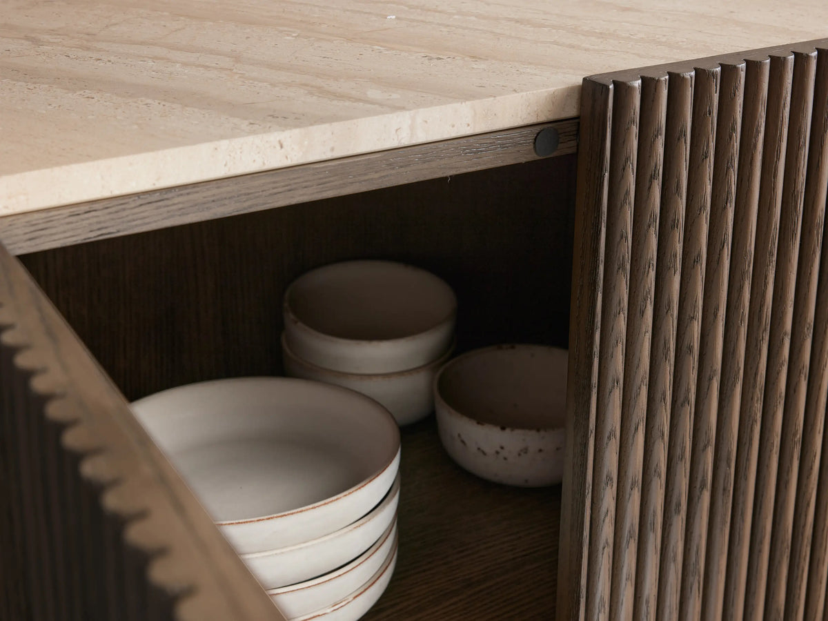 Astor Hall Chest: Curved dark oak veneer cabinet with vertical reeding. Right door open showing shelves. Light marble top.