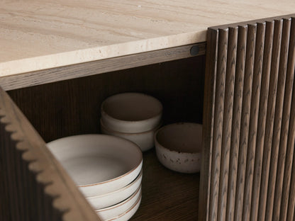 Astor Hall Chest: Curved dark oak veneer cabinet with vertical reeding. Right door open showing shelves. Light marble top.