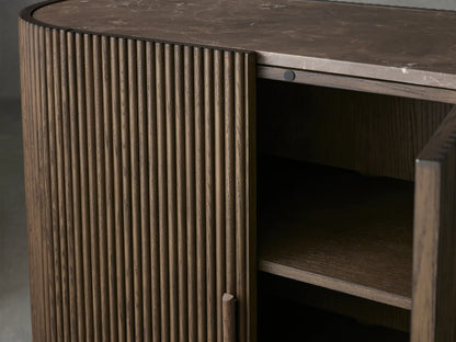 Astor Hall Chest with oak reeding, open soft-close door reveals shelves, on gray backdrop. Marble top not visible.