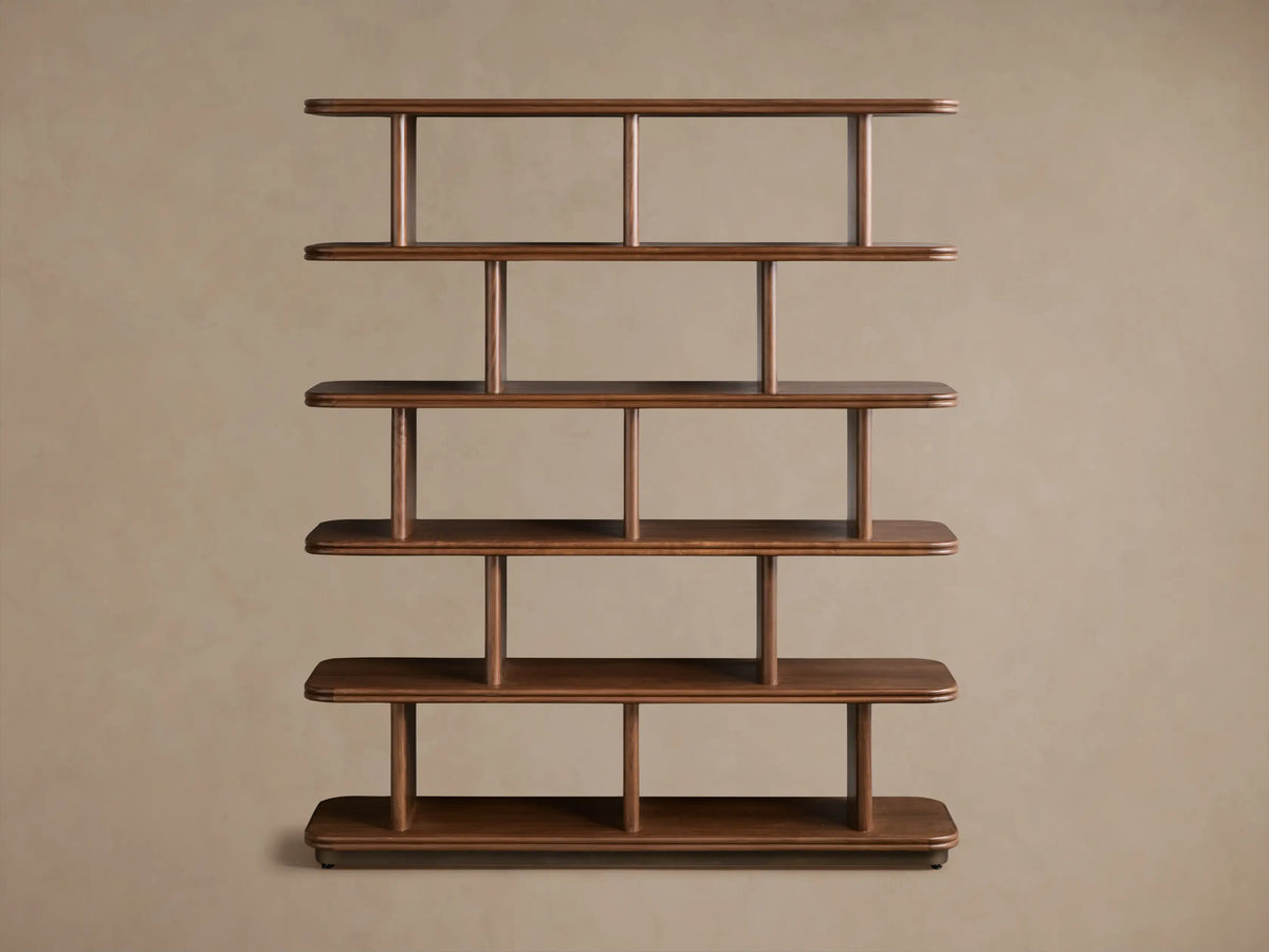 Front view of dark brown Caden Shelving, a tall wooden unit with five shelves, rounded edges, and cylindrical supports.