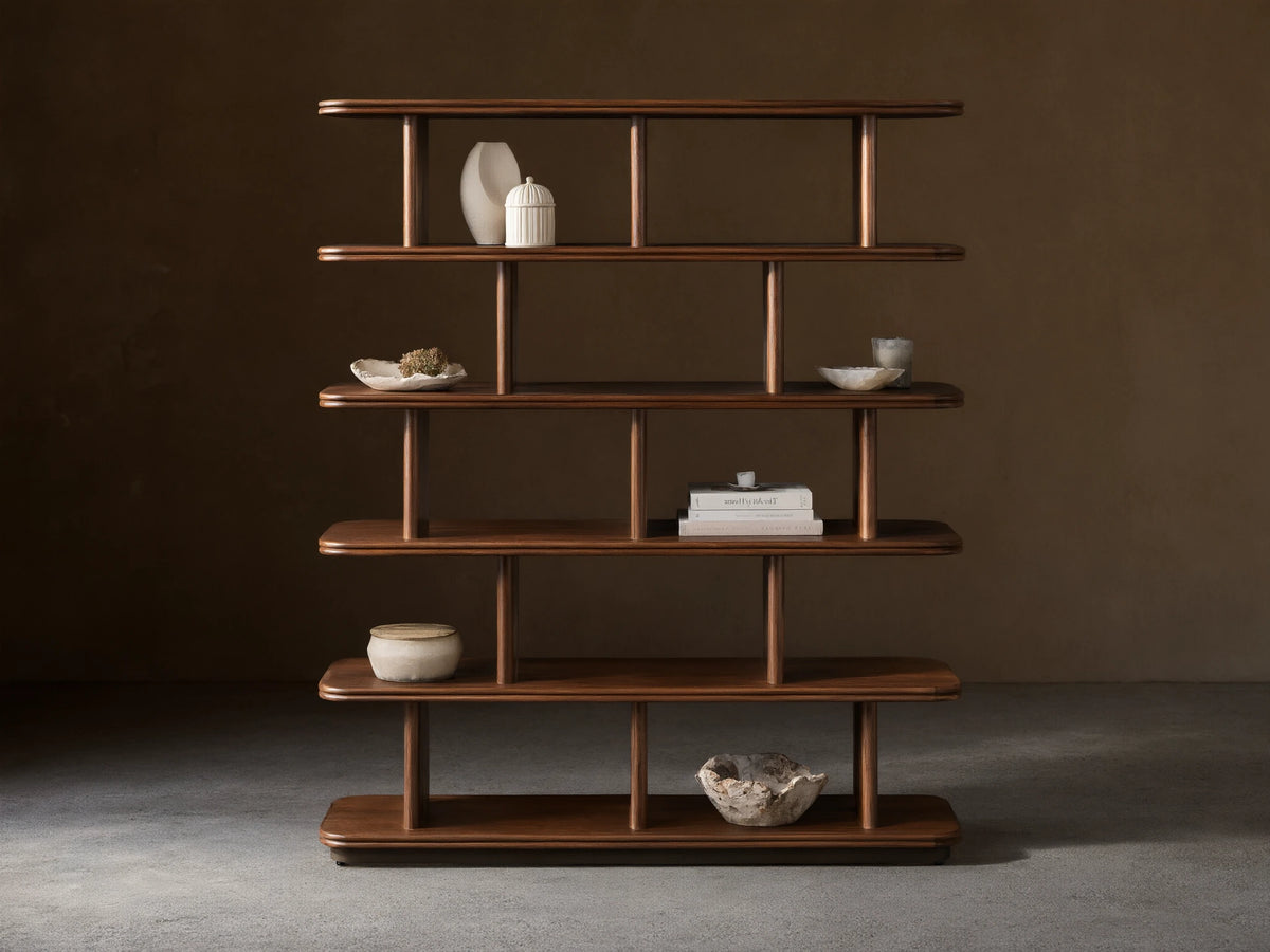 Front view of dark brown Caden Shelving, a tall wooden unit with five shelves, rounded edges, and cylindrical supports.