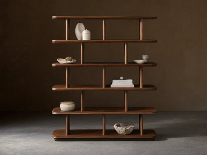 Front view of dark brown Caden Shelving, a tall wooden unit with five shelves, rounded edges, and cylindrical supports.