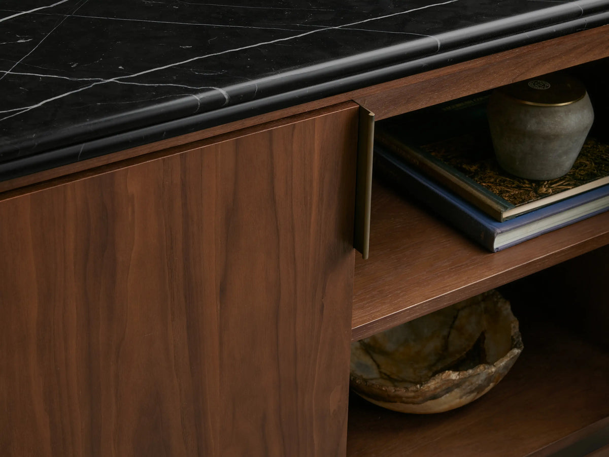 Caden Media Console, dark walnut wood with black Marquina stone top & antique bronze hardware. Right two doors open to shelves.