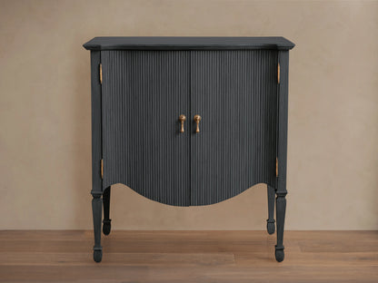 Conrad Hall Chest in Eclipse finish, blue with vertical ribbed texture, featuring two doors, bronze handles, on elegant curved legs.