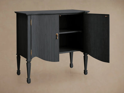 Conrad Hall Chest in Dhurrie Brown, with two open cabinet doors revealing shelves. Features a ribbed texture, brass hinges, and ornate legs.