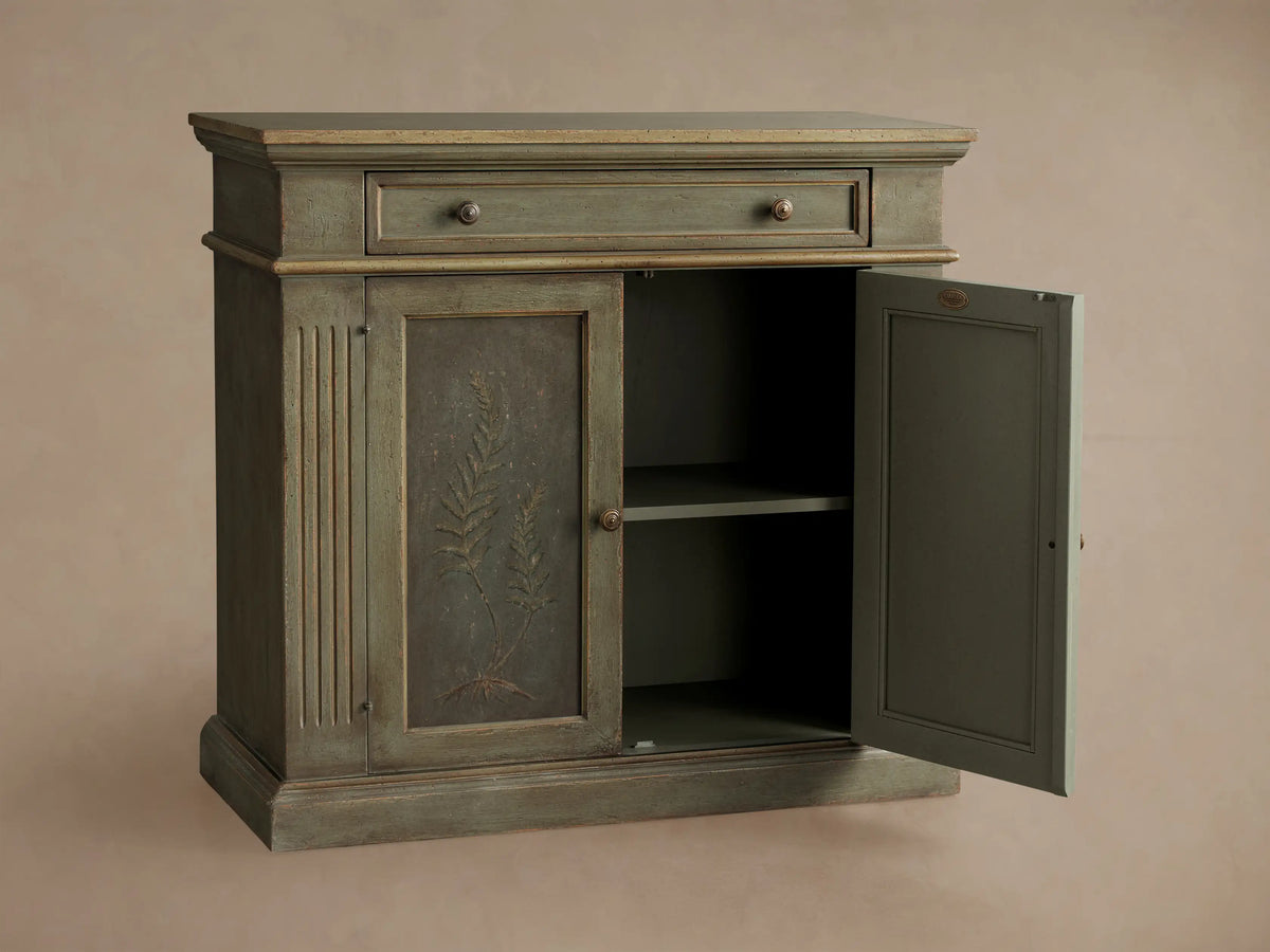 Cosetta Buffet, distressed sage green wood with top drawer, two doors, hand-painted ferns, fluted details & aged hardware.