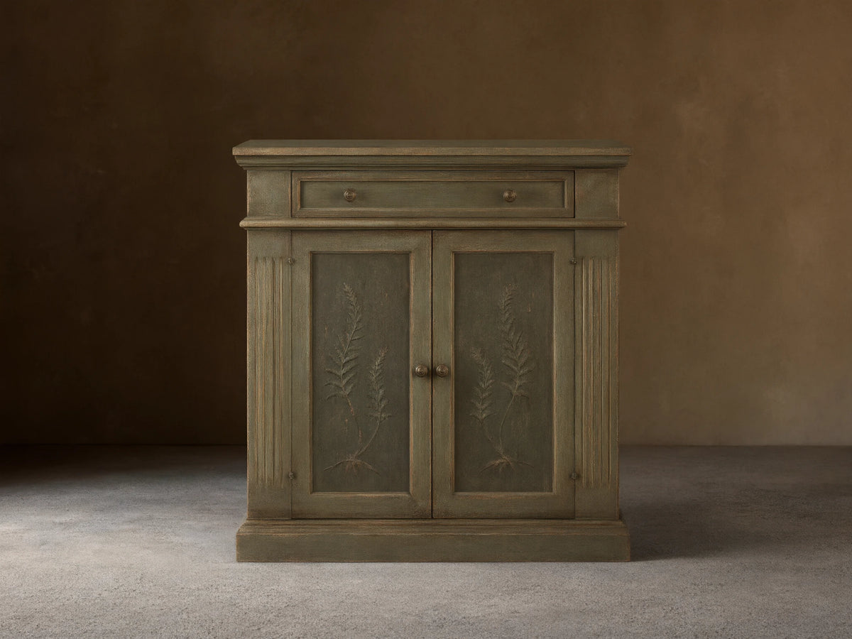 Cosetta Buffet, distressed sage green wood with top drawer, two doors, hand-painted ferns, fluted details & aged hardware.