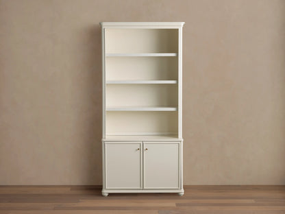 Cream oak Carlisle Hutch with open shelves displaying decor, and two lower cabinet doors, on a light brown wall and wood floor.