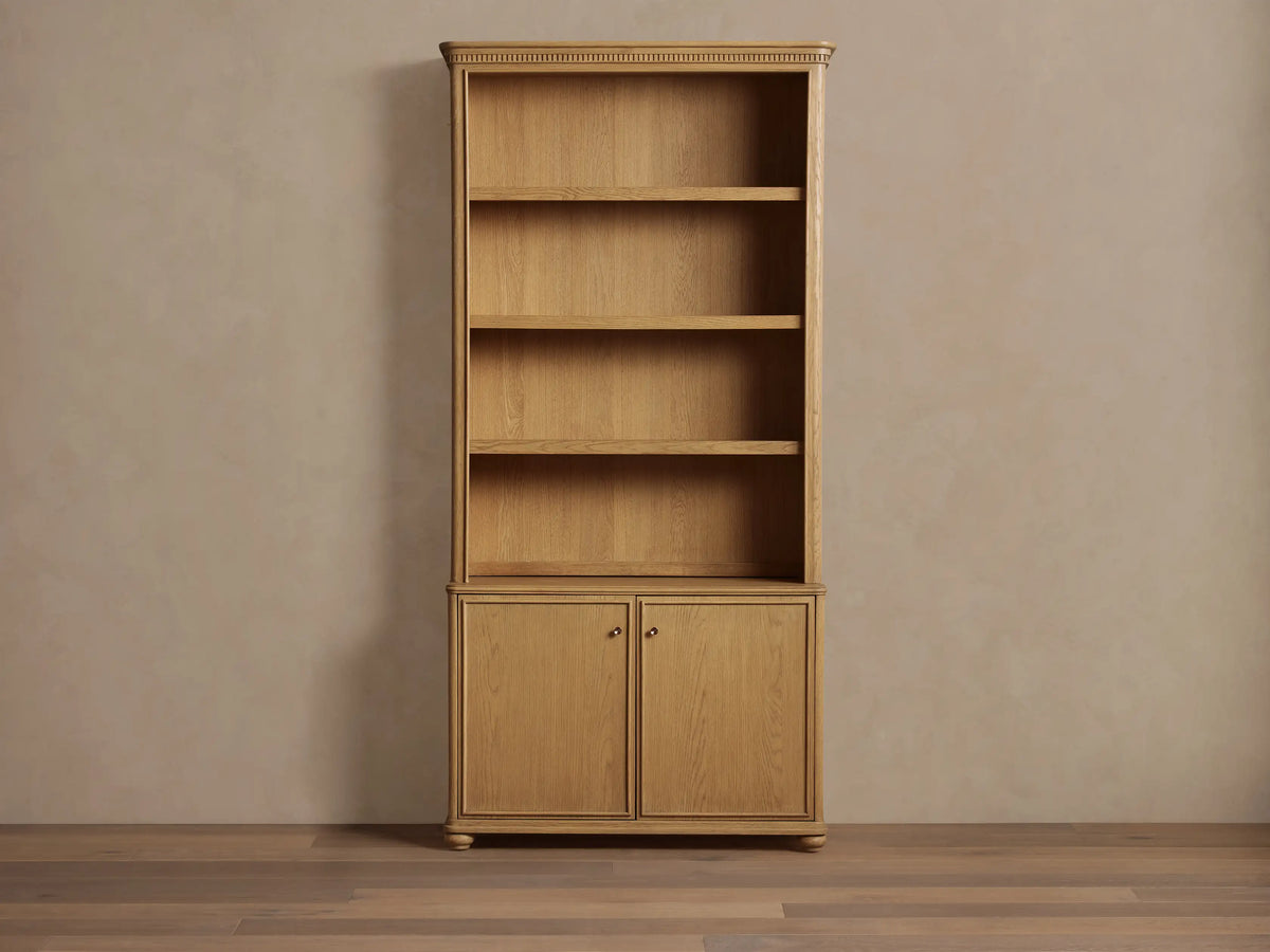 Carlisle Hutch: Natural oak wood hutch with 4 open shelves above 2 cabinet doors, styled with home decor items.