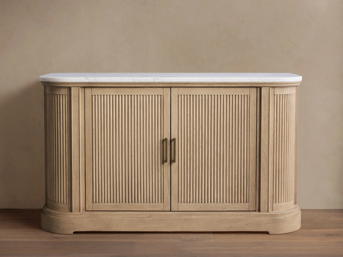 Coventry Buffet: Light white oak wood buffet with fluted doors, antique brass handles, and a white Carrara marble top.