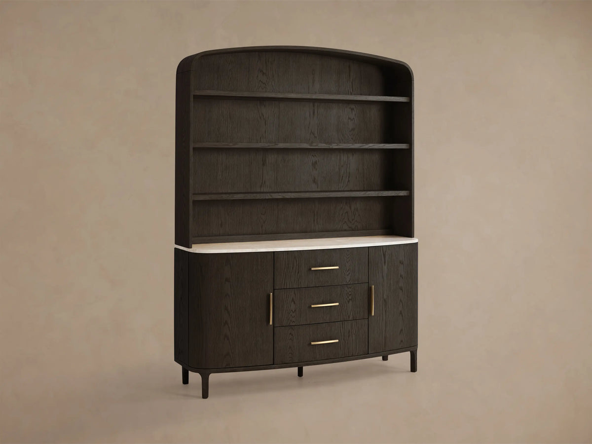 Front view of the dark oak Danny Hutch with Drawers, featuring a rounded top, three shelves, light marble counter, three central drawers, and two cabinet doors with brass pulls.