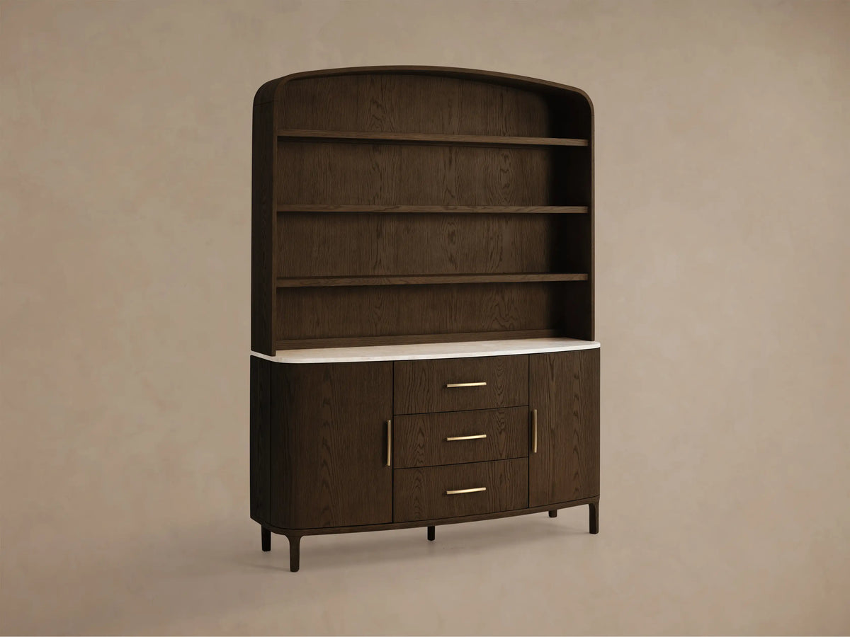 Front view of the dark oak wood Danny Hutch with Drawers, featuring a white Carrara marble top, three shelves, two doors, and three drawers with gold hardware.