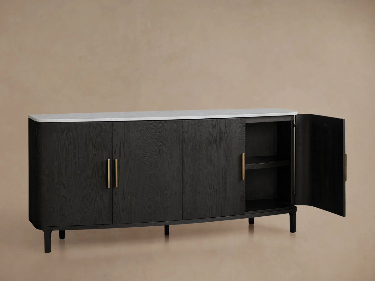 Danny Sideboard with a black oak wood finish and brass handles, featuring a white Carrara marble top. Right door open showing shelves.