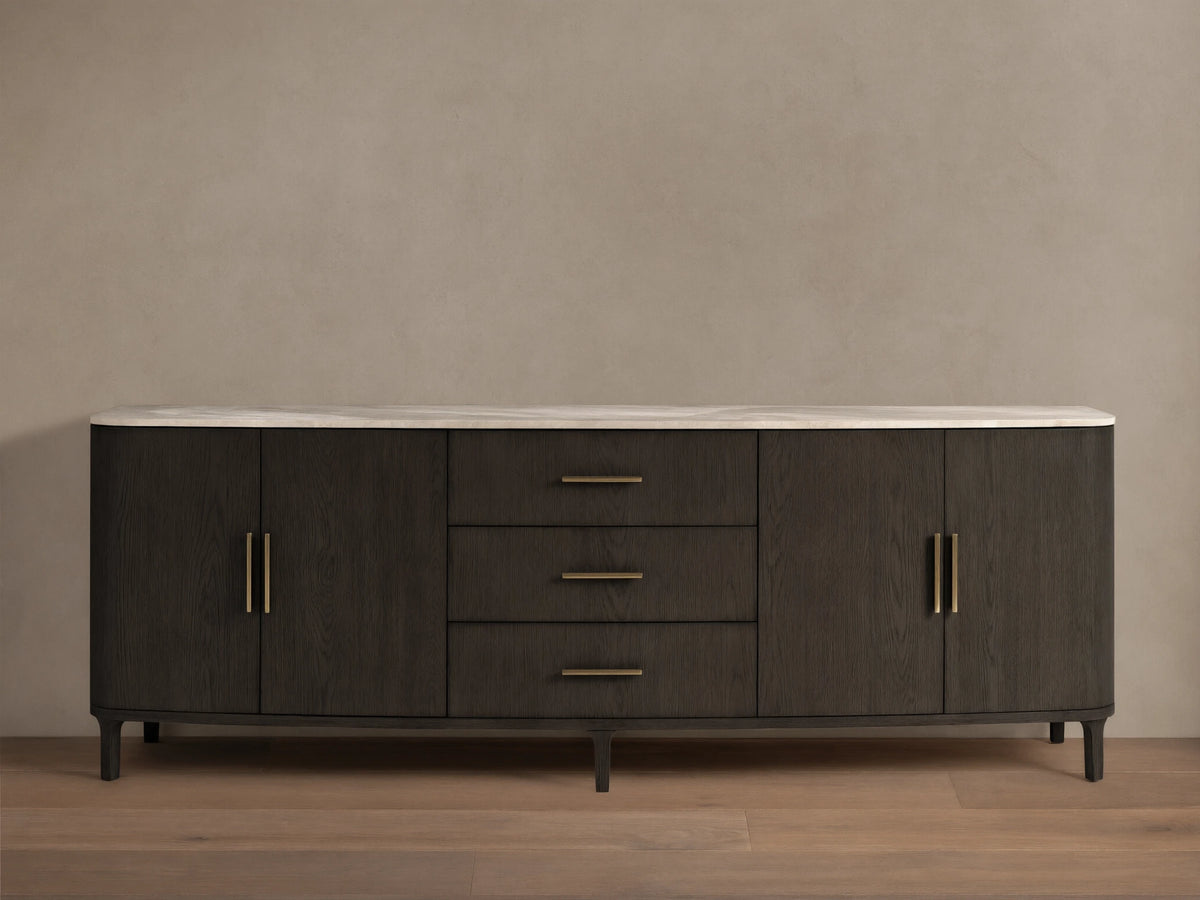 Front view of the dark oak Danny Sideboard with Drawers, featuring a royal cream marble top, two side cabinets, and three central drawers with brass pulls.