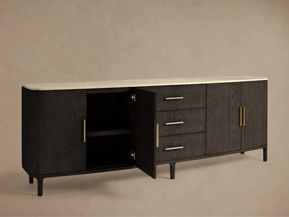 Front view of the dark oak Danny Sideboard with Drawers, featuring a royal cream marble top, two side cabinets, and three central drawers with brass pulls.