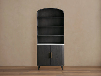 Danny Hutch in ebony finish, featuring a curved top, three shelves, white marble base, and dual-door cabinet with bronze handles.